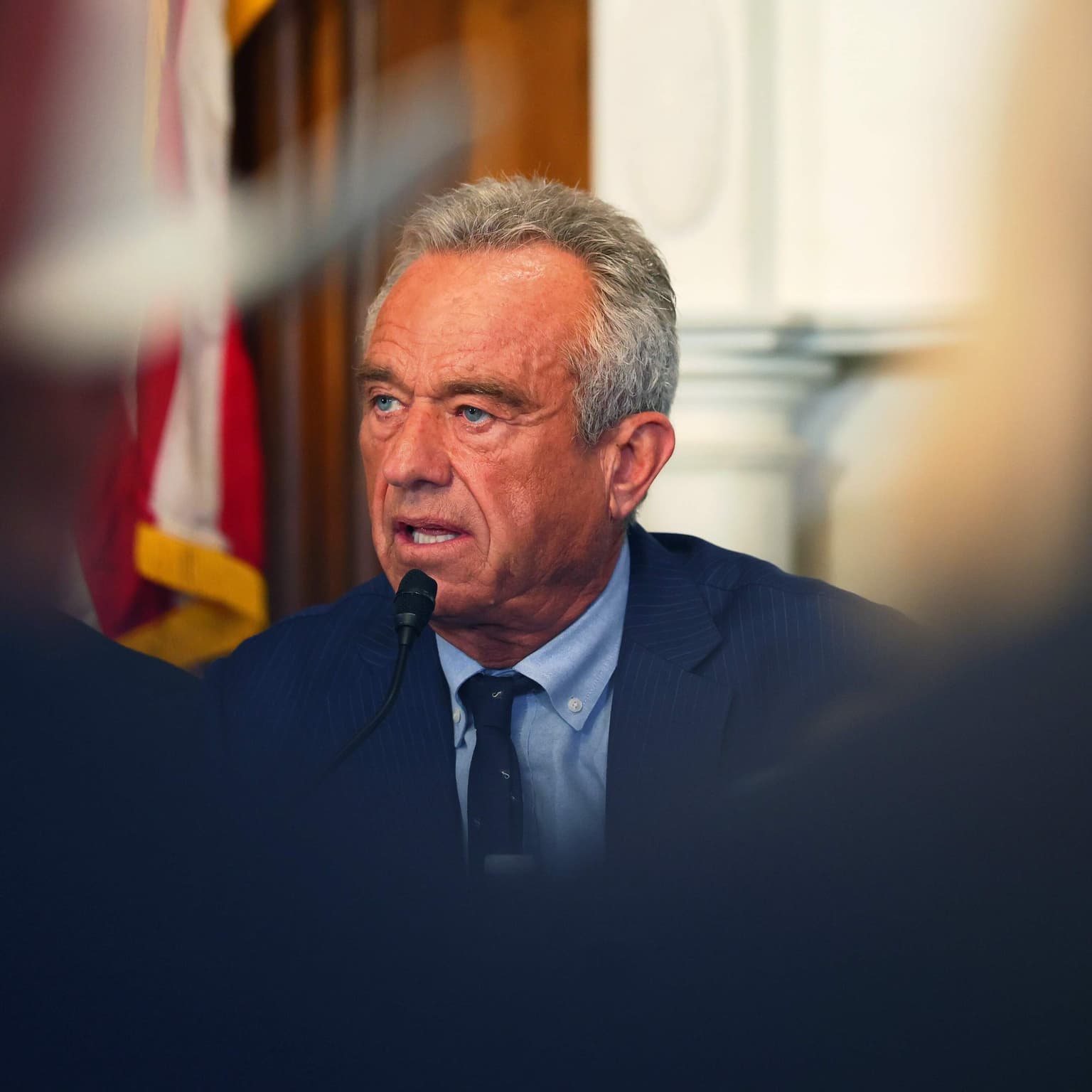 How have RFK Jr.'s vaccine policies impacted America's public health? artwork