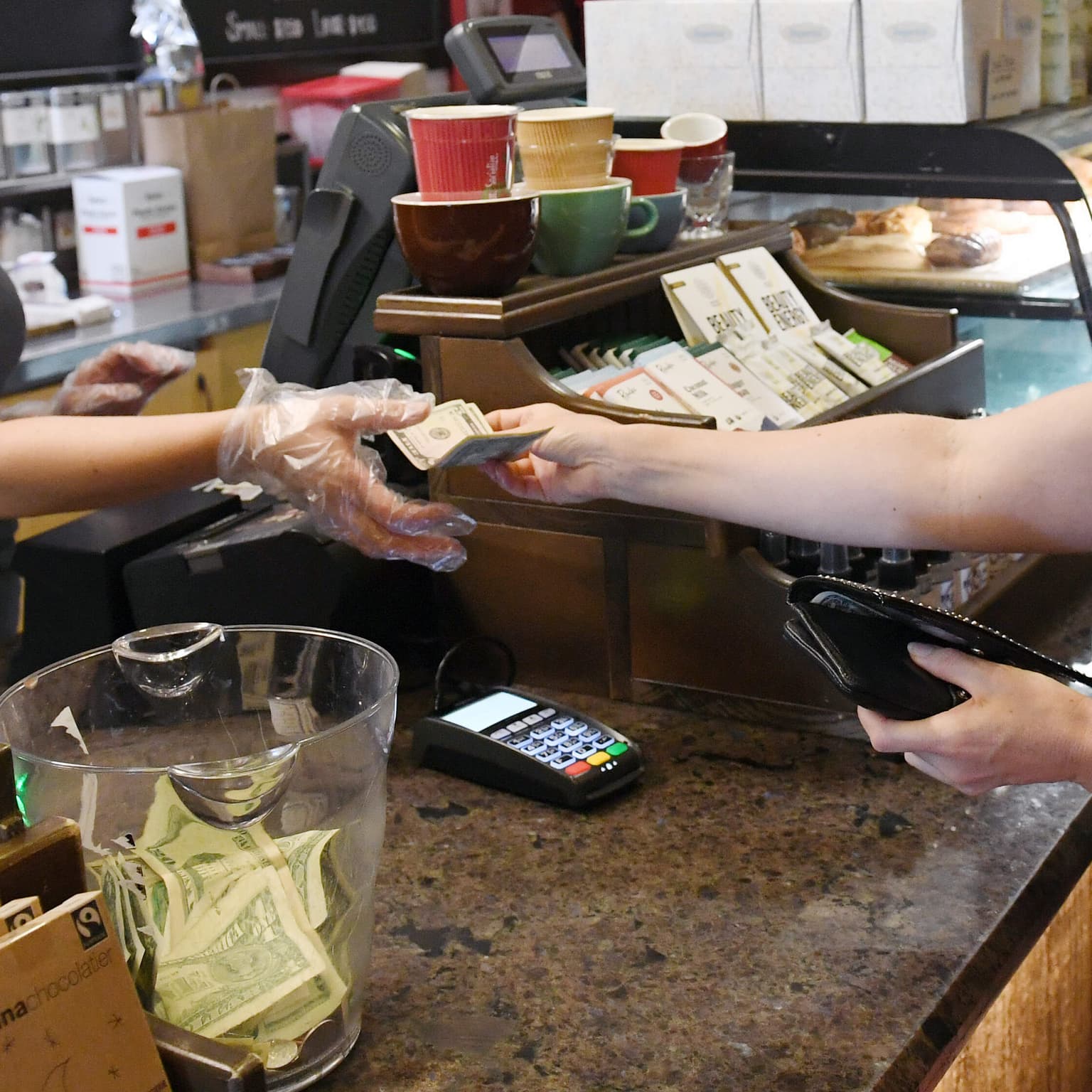 How would banning taxes on tips actually work? artwork