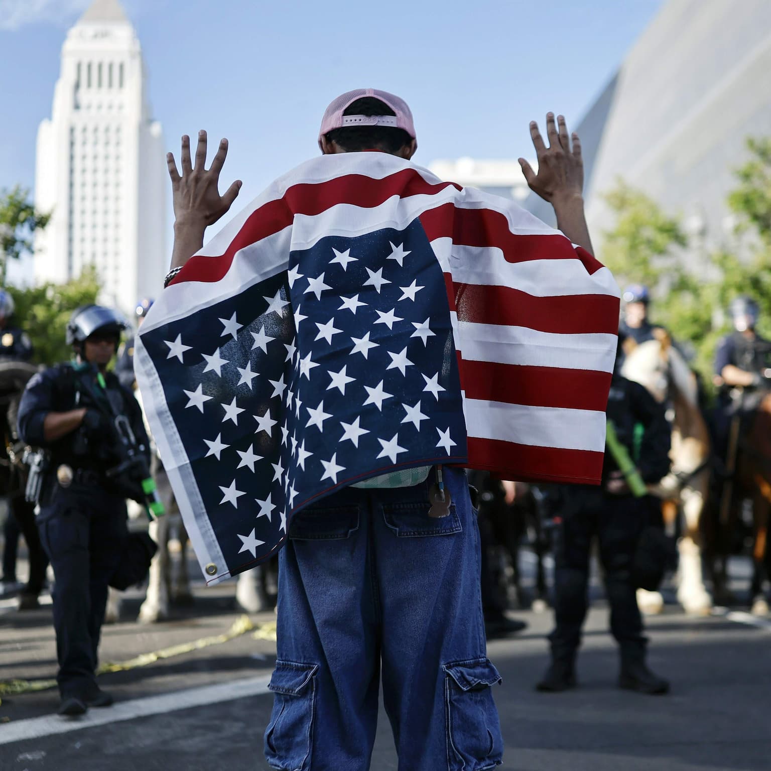 Covering the military parade and a No Kings rally on the same day artwork