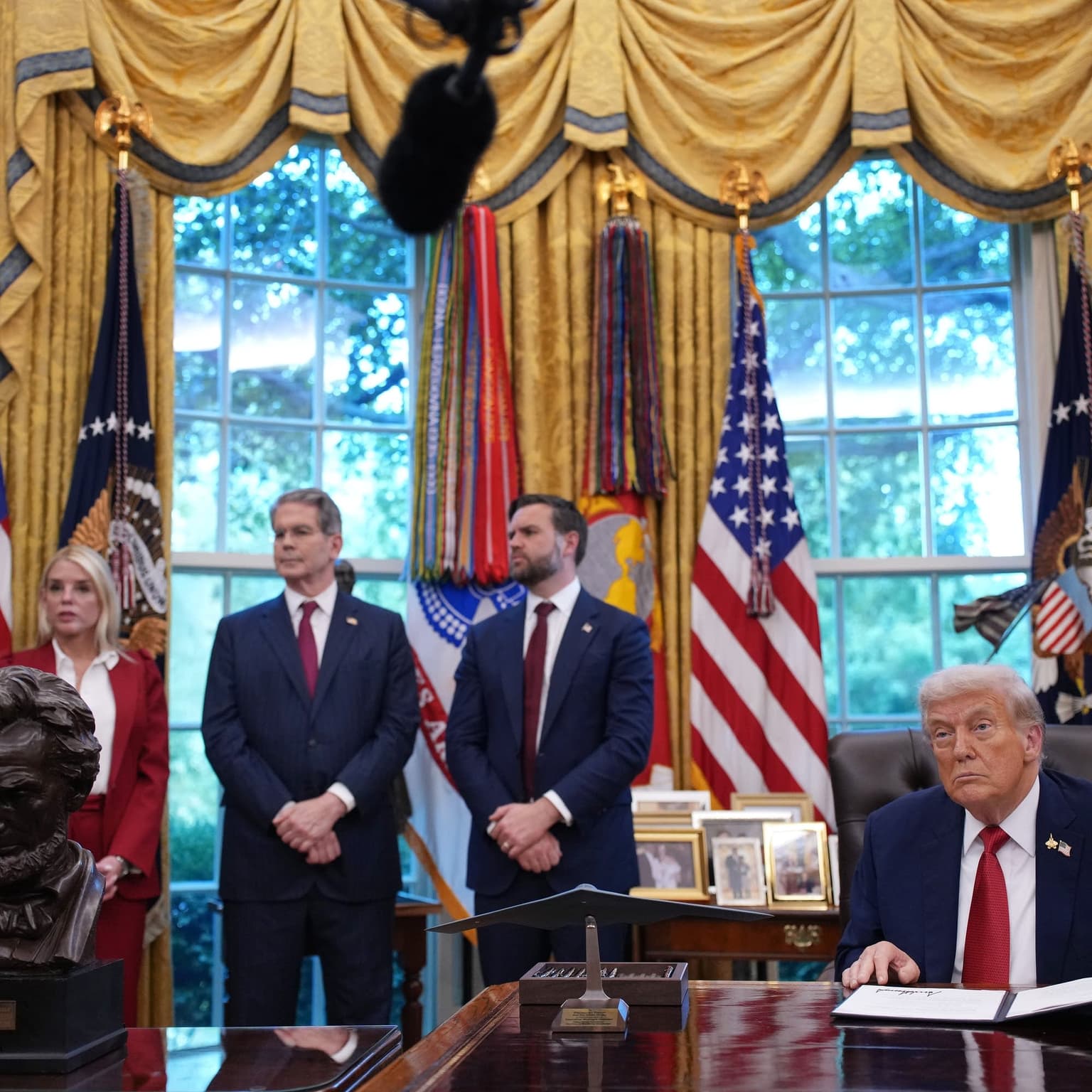 The "stuck economy," tariffs and Wall Street artwork