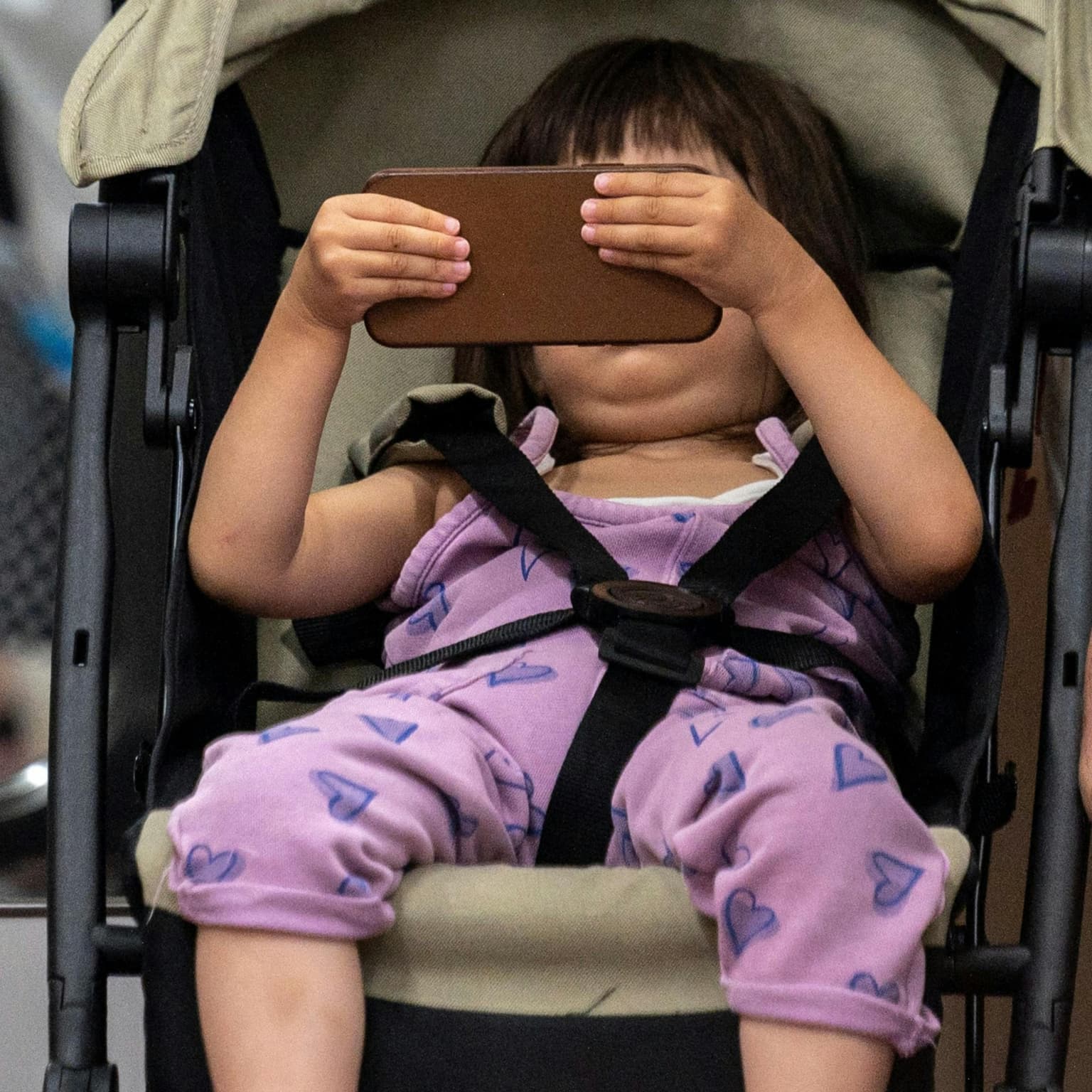 Should we give toddlers phones? artwork