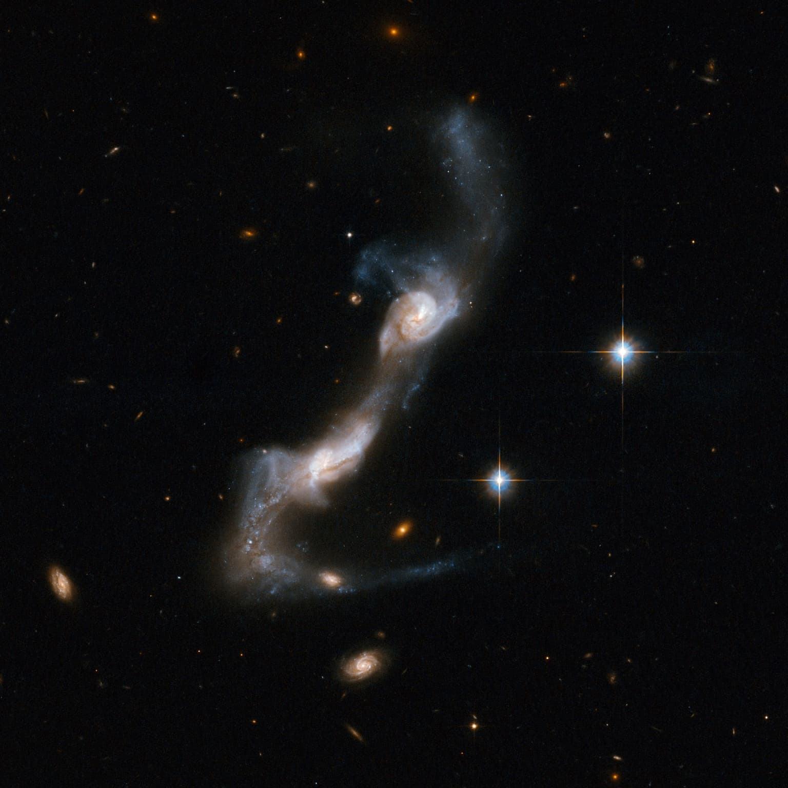 Cosmic Queries – The Atlas of Peculiar Galaxies with Charles Liu artwork
