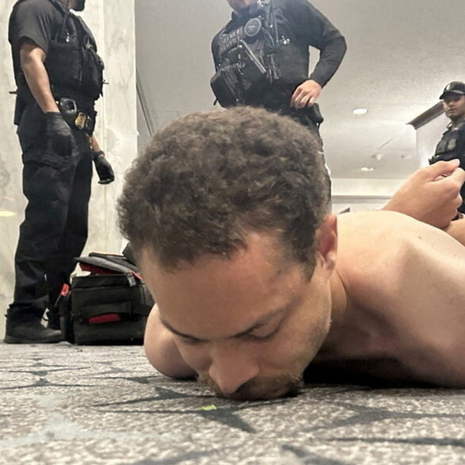 Suspect due in court after shooting at Trump press dinner artwork