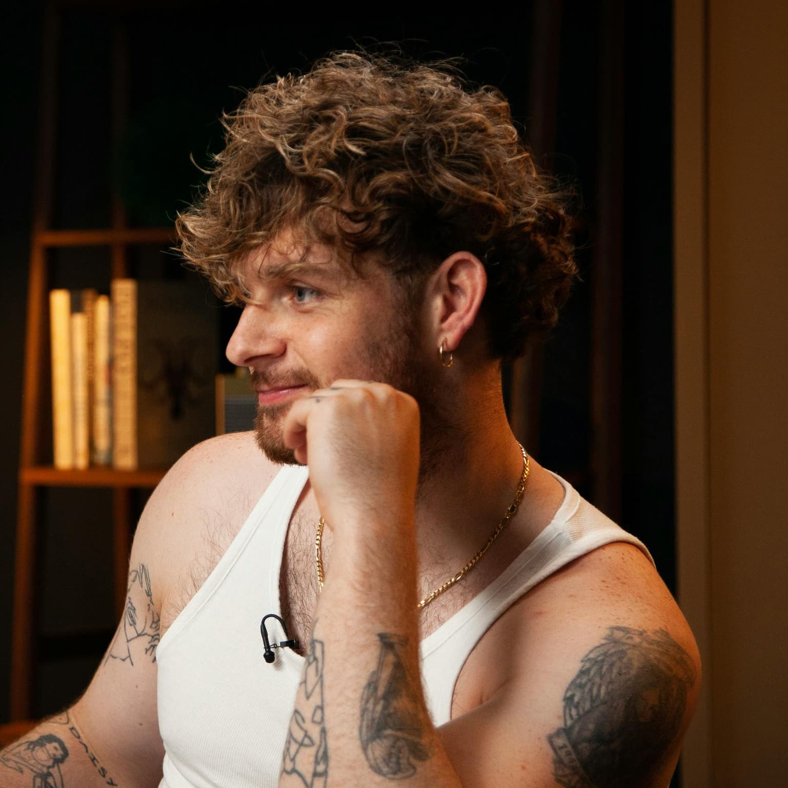 Singer songwriter Tom Grennan and hake with roast red pepper sauce artwork