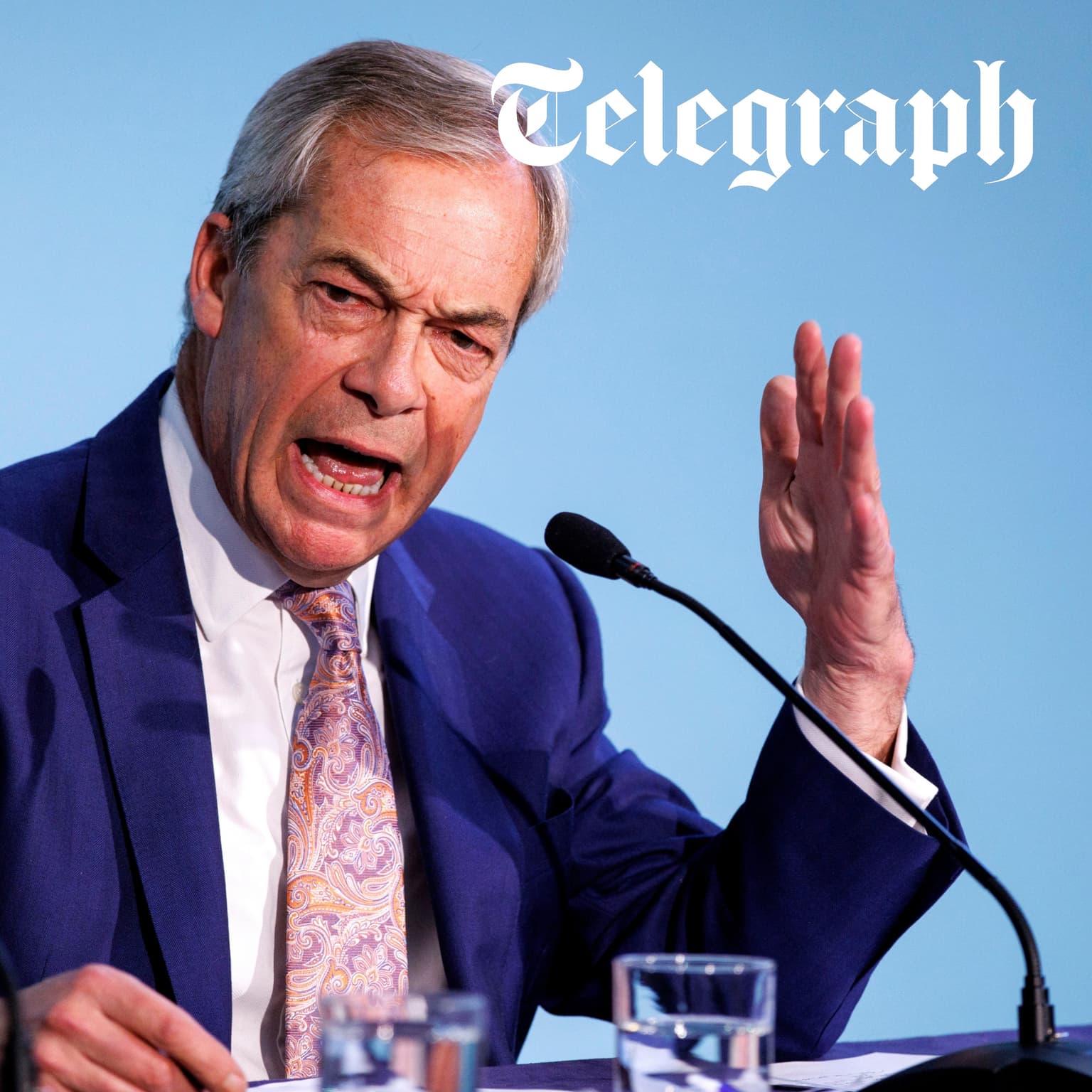 Farage defends his anti-foreigner budget artwork