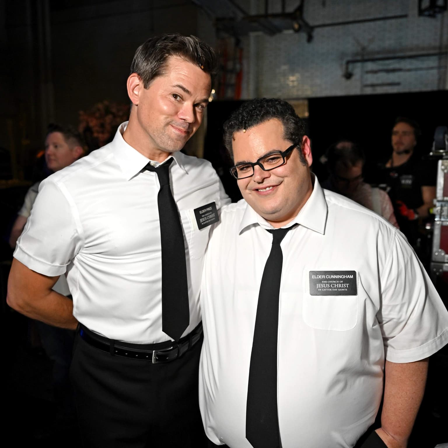 Andrew Rannells & Josh Gad look back on 15 years of ‘Book of Mormon’ artwork