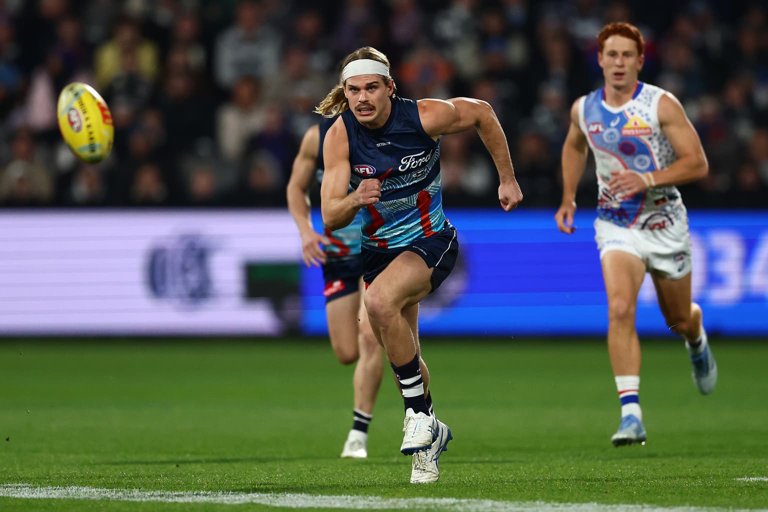 Cats fend off Dogs in high scoring thriller artwork