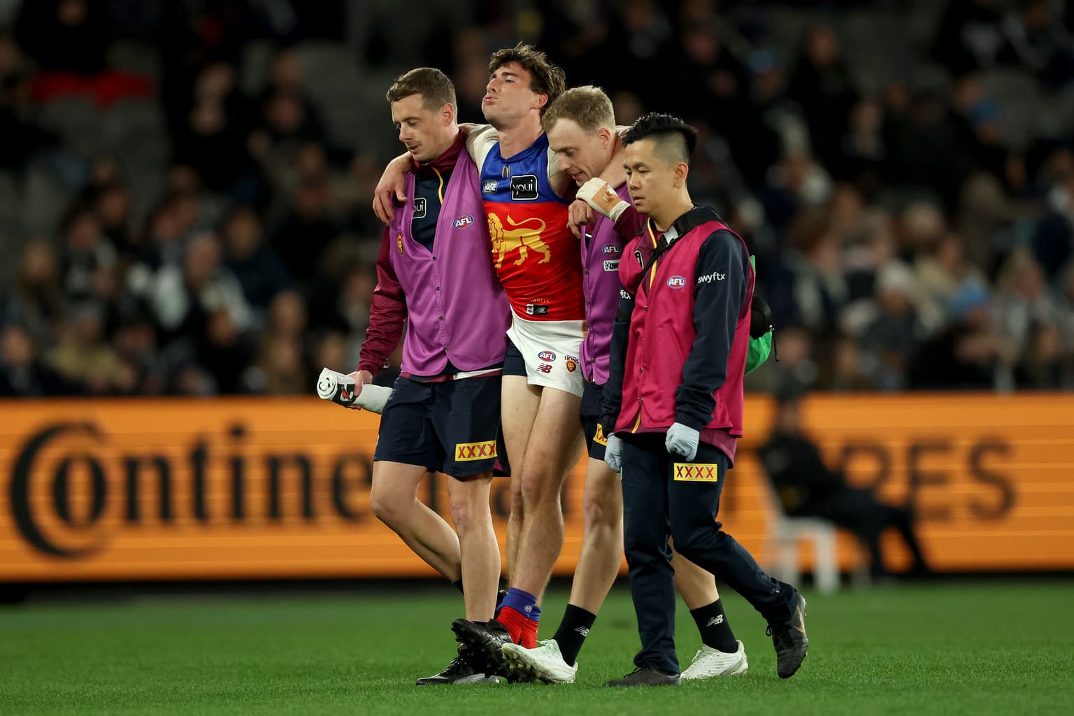 Injuries and ump contact as Lions prevail in Melbourne artwork