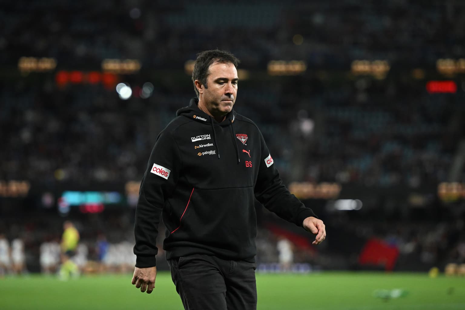 Why Brad Scott's Essendon sacking leaves an "awful taste" artwork